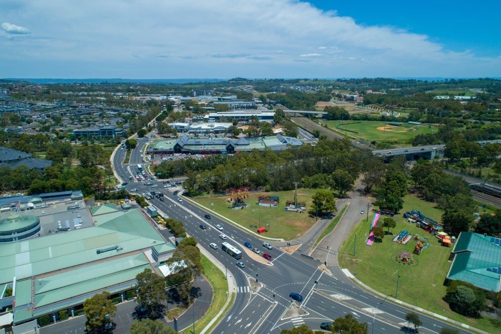 An Aerial View of a City With a Lot of Buildings and Roads — Huntlee Blinds and Shutters in Campbelltown, NSW