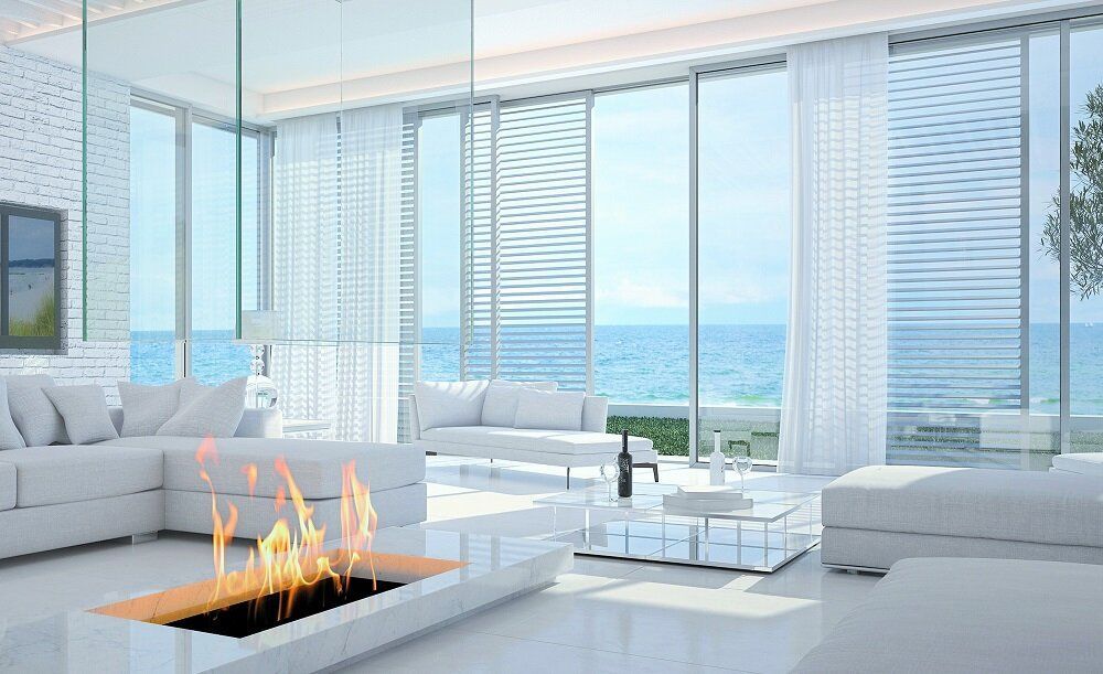 A Bedroom With A Bed And A Window — Huntlee Blinds and Shutters in Badagarang, NSW