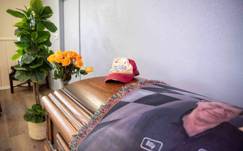 Close=-up of personalized casket display featuring meaningful details and memories. 