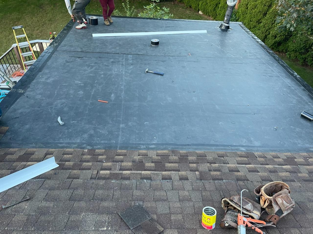 new flat rubber roof installed on home
