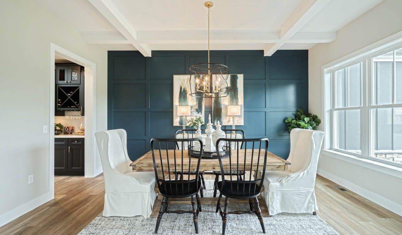 Silverbrooke model dinning area with navy accent wall