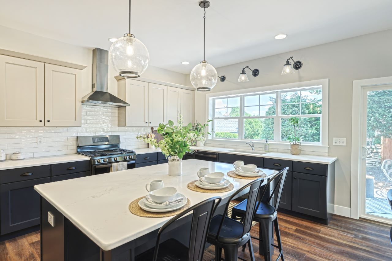 Statement lighting and two toned kitchen cabinets