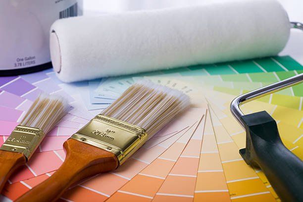 Close-Up Image of Paint Brushes, Roller, Paint Can, and Paint Samples — Jacksonville, NC — C & S Paint Center