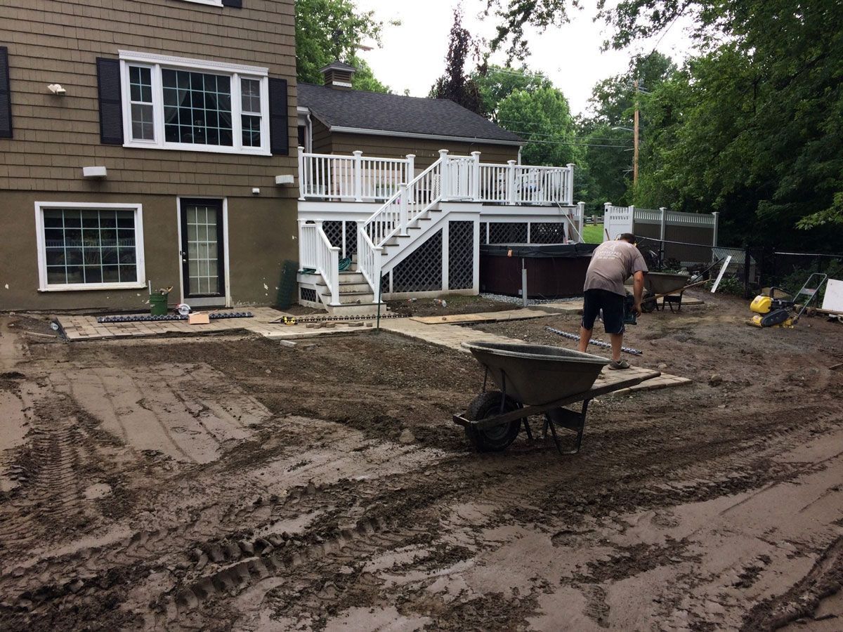 Man On The Backyard — Shrewsbury, MA — Maintenance Free Landscapes