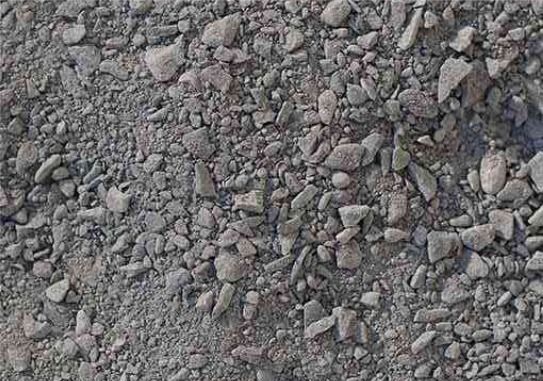 A pile of gravel and rocks on the ground.