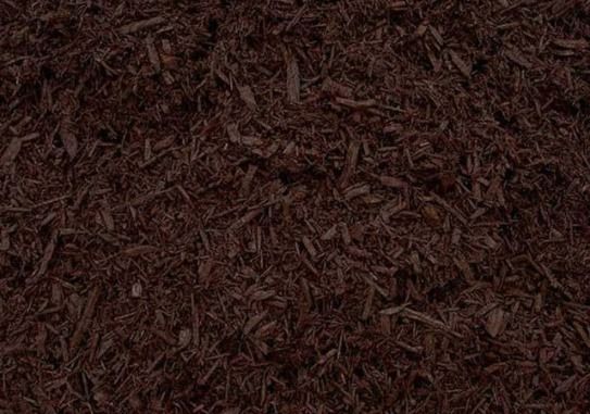 A close up of a pile of brown mulch.