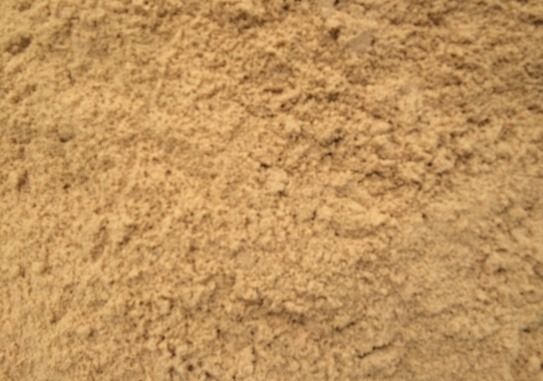 A close up of a pile of sand.