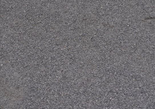 A close up of a gray carpet texture.