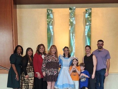  From left to right: Greenbrier Primary Counselor Mrs. Thompson, Ms. Barros, Greenbrier Primary Principal Ms. Lowden, Mrs. Scianna, Ballet Virginia Dancer, Elsbeth and her family.