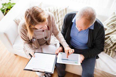 Family Medicine — Nurse Giving Information to Her Patient in Wichita, KS