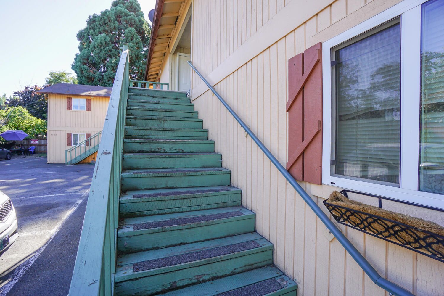 A set of stairs leading up to the second floor of a building.