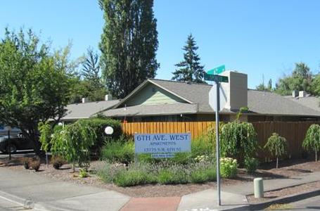 A house with a sign that says oth ave west