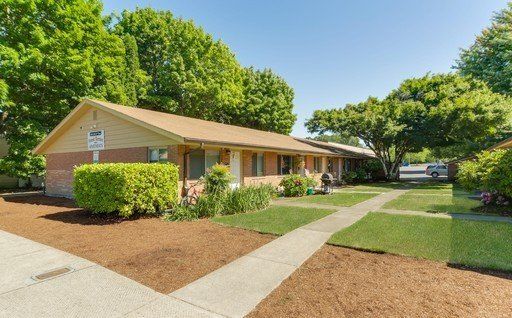 A row of houses with a no parking sign in front of them