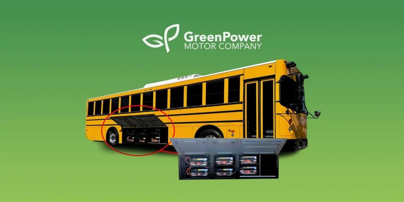GreenPower school bus on green background with company logo and battery pack display