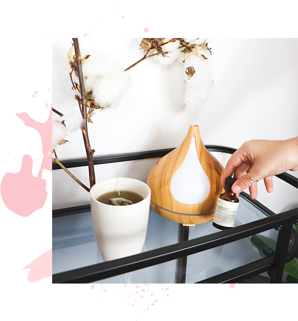 essential oil diffuser and cup of tea