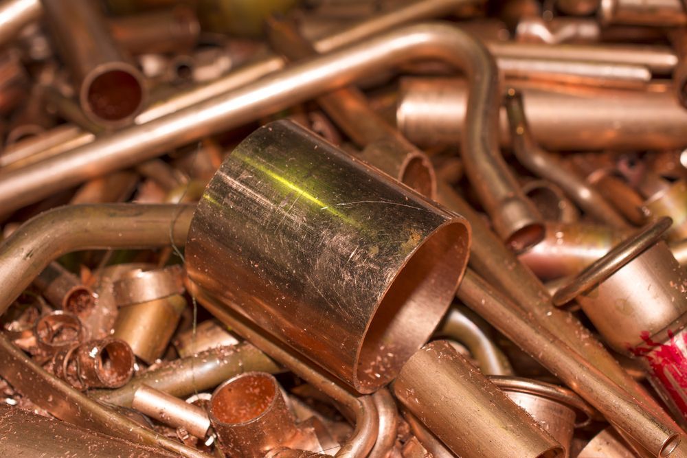 Pile of Copper Pipes and Fittings, Showing Various Shapes and Sizes — B & B Scrap Metal in Noosaville, QLD