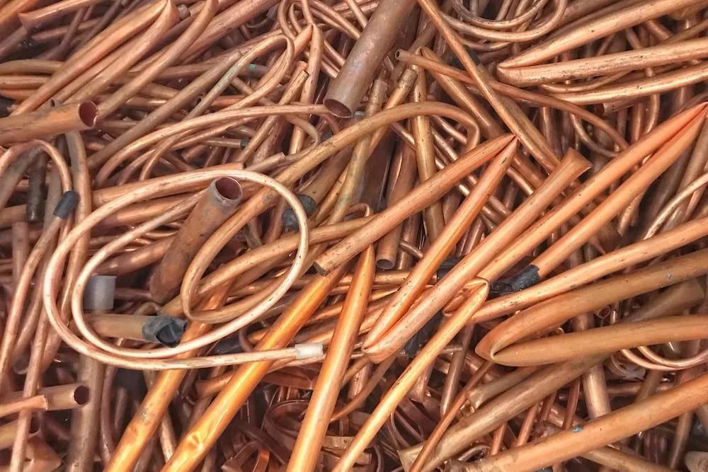 Pile of Copper Tubing, Various Sizes, Shades of Orange-brown, Likely for Recycling — B & B Scrap Metal in Noosaville, QLD