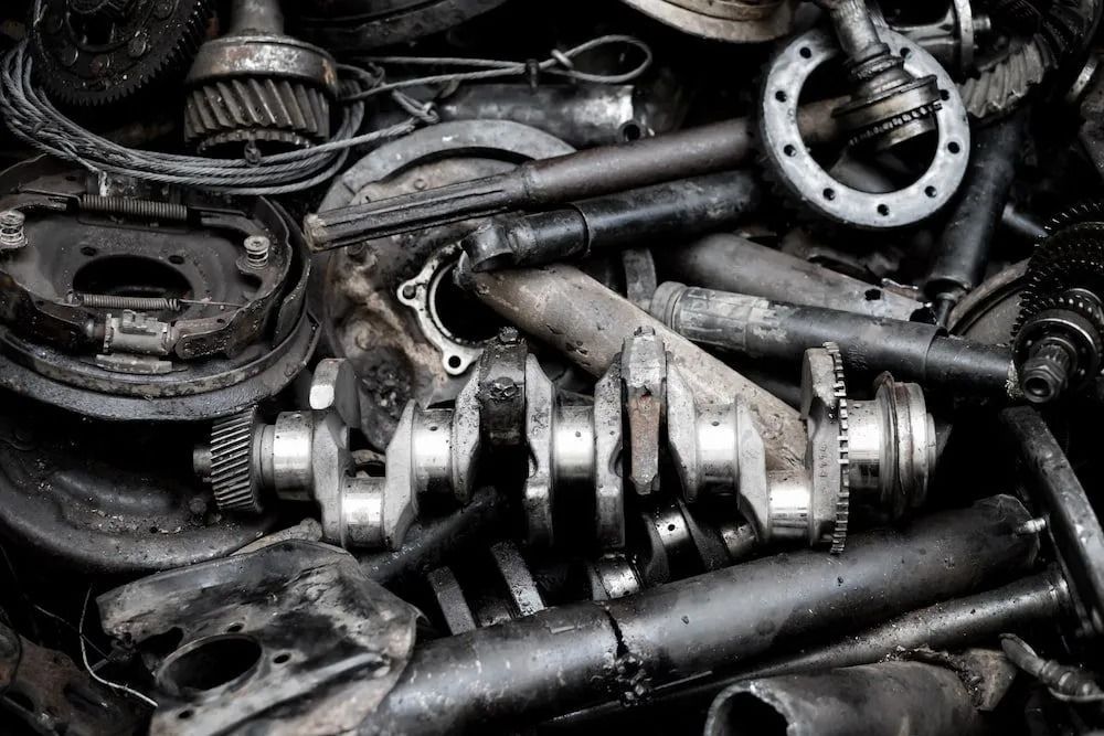 Pile of Assorted Dark Metal Car Parts — B & B Scrap Metal in Noosaville, QLD