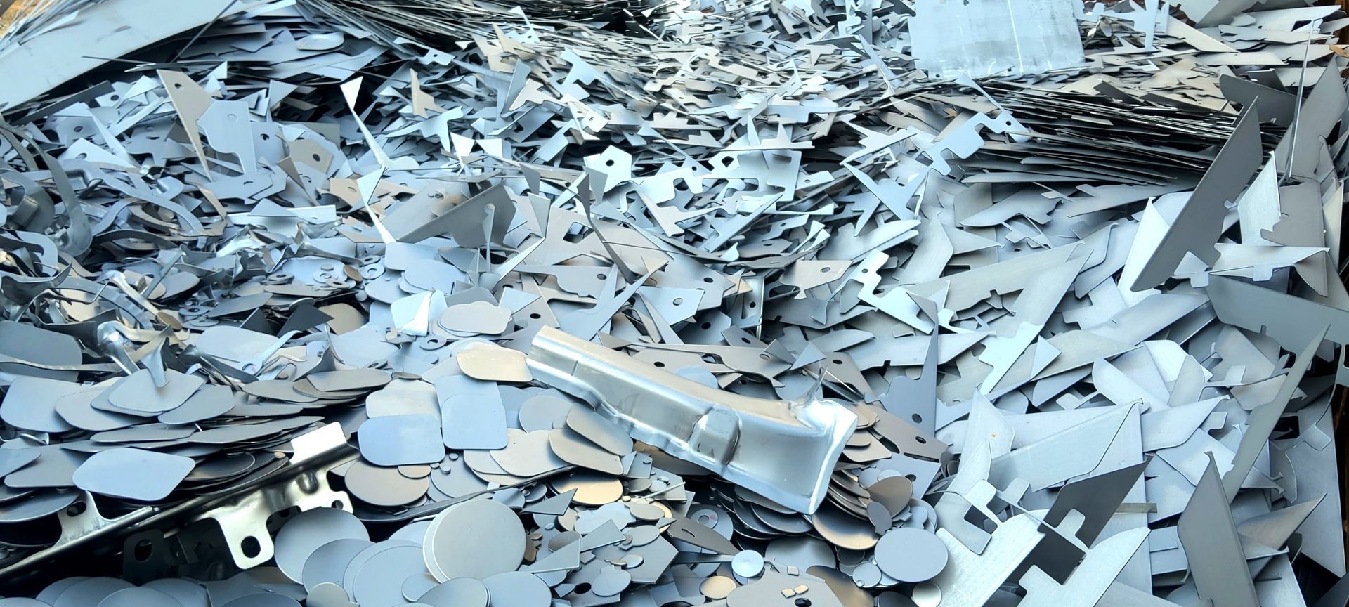 Pile of Shiny, Silver Metal Scraps, Possibly Industrial Waste — B & B Scrap Metal in Coolum, QLD