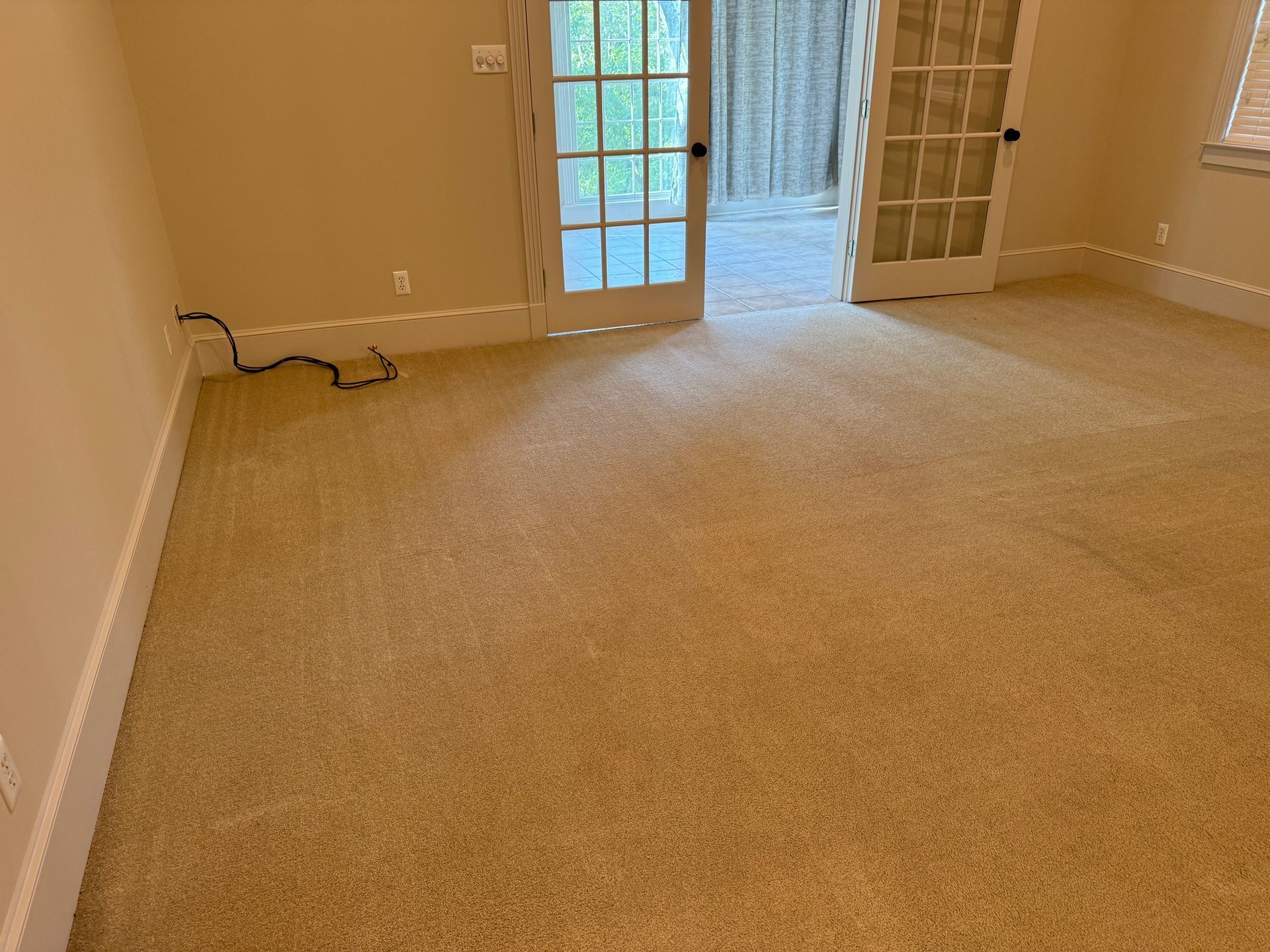 A bathroom with a sink , toilet and mirror.