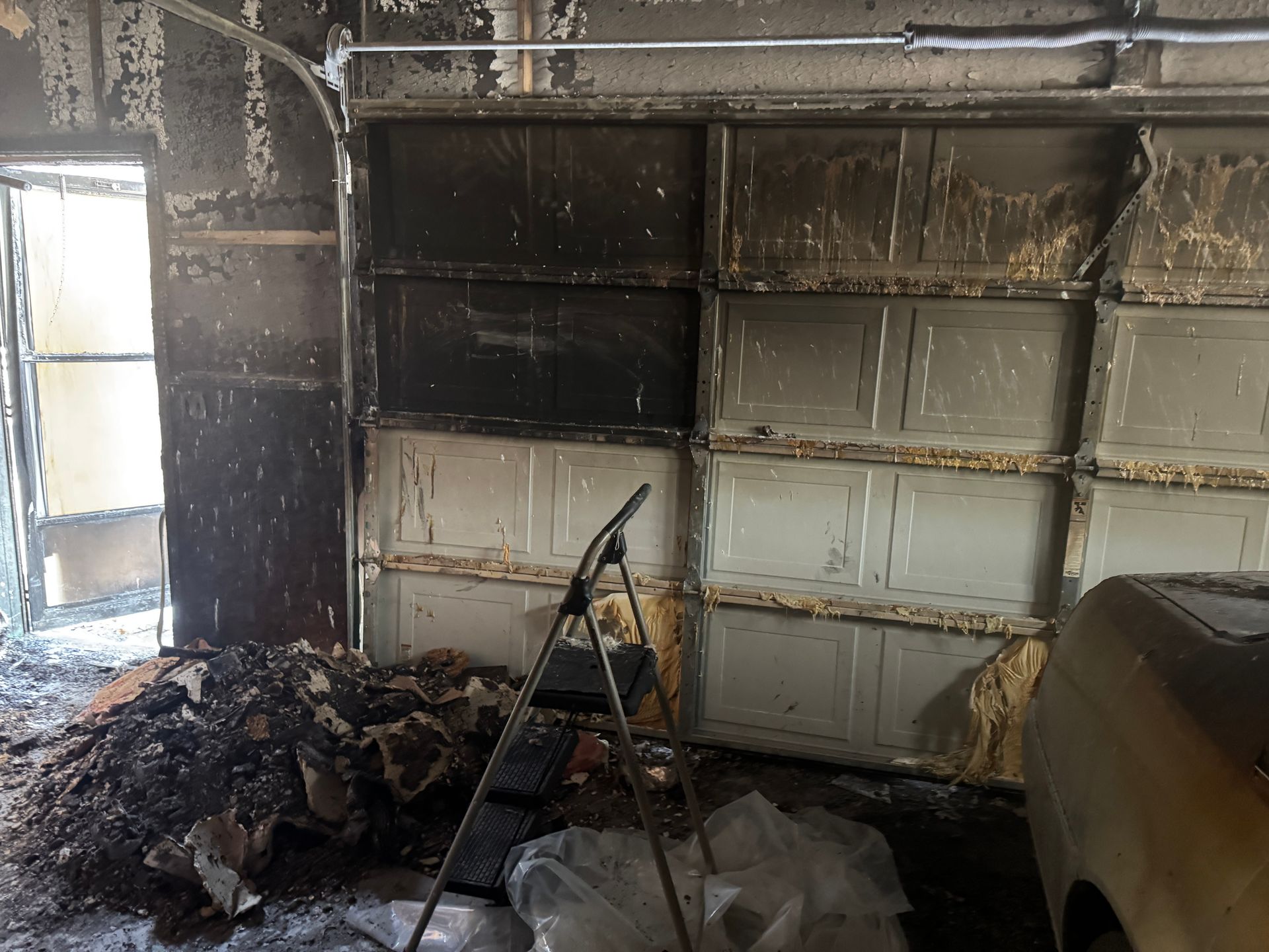 Heavily damaged garage interior. 