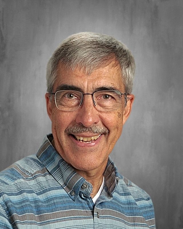 Smiling head shot of Pete Sehloff