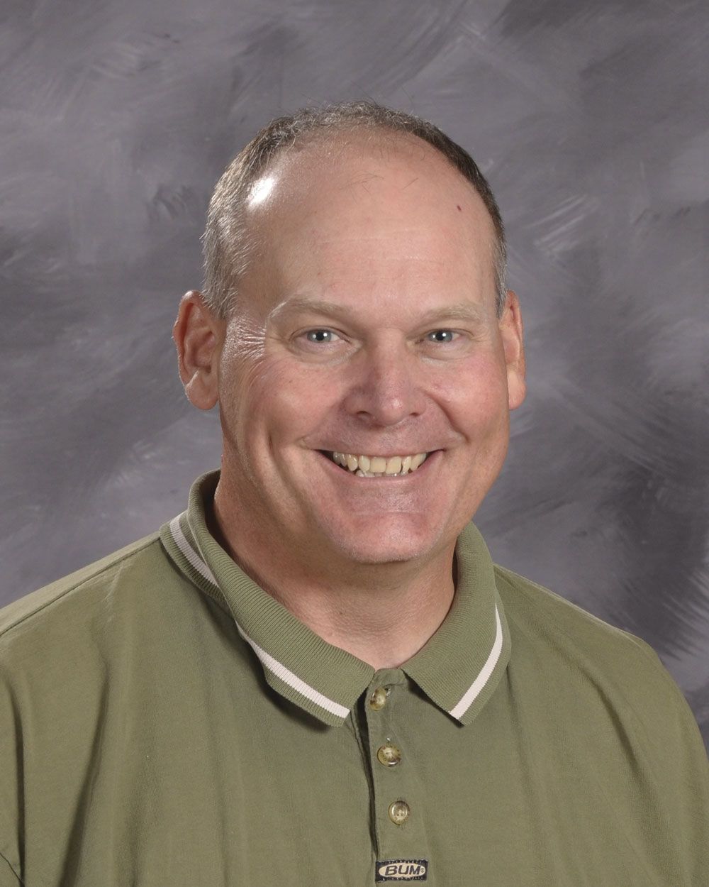 Smiling head shot of Joel Kramer