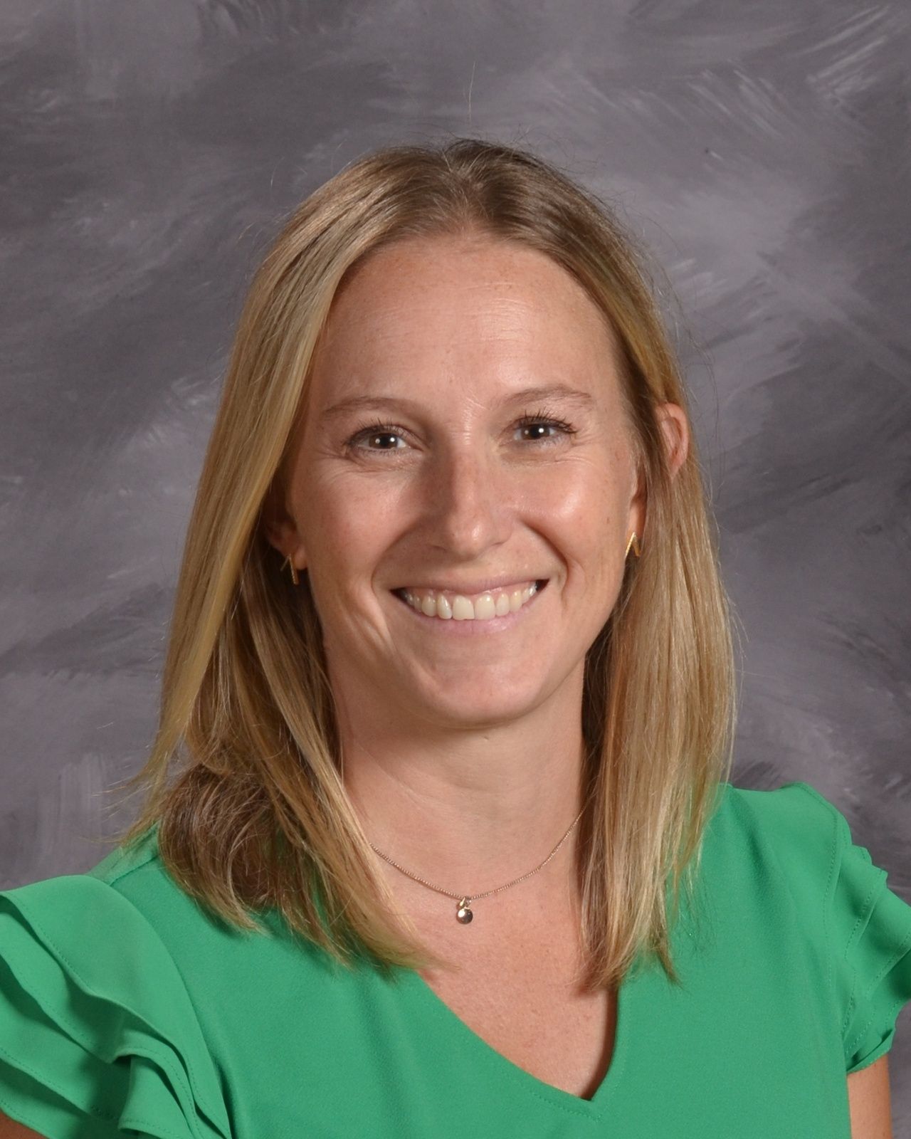 Smiling head shot of Julia McLister