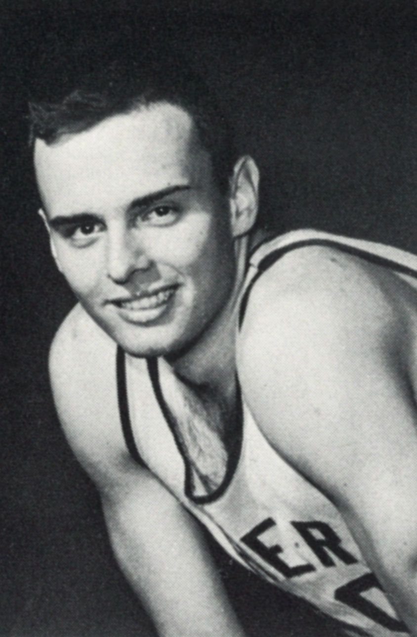 Male basketball player smiling at the camera
