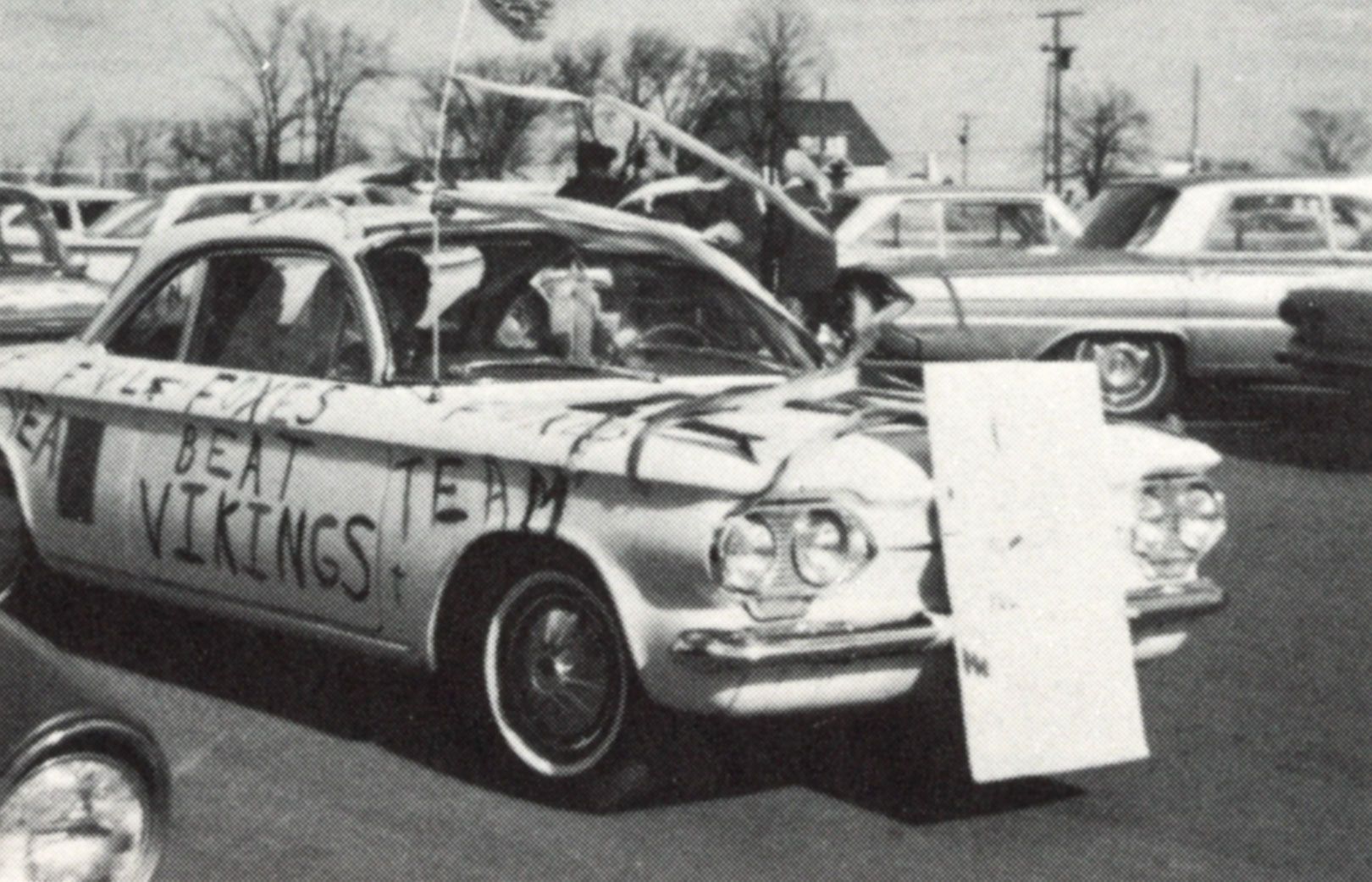 Car decorated for Homecoming and with writing on it