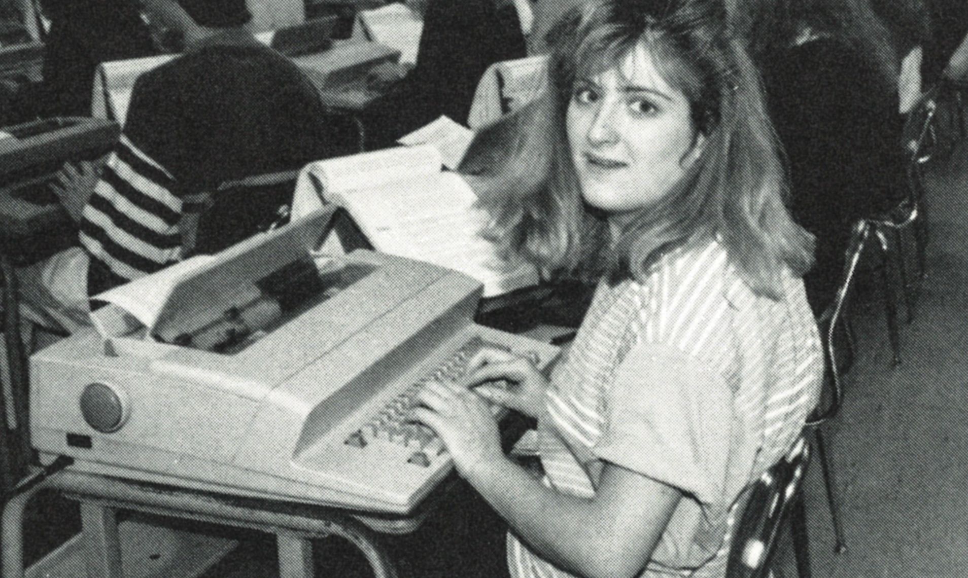 Female student at a typewriter