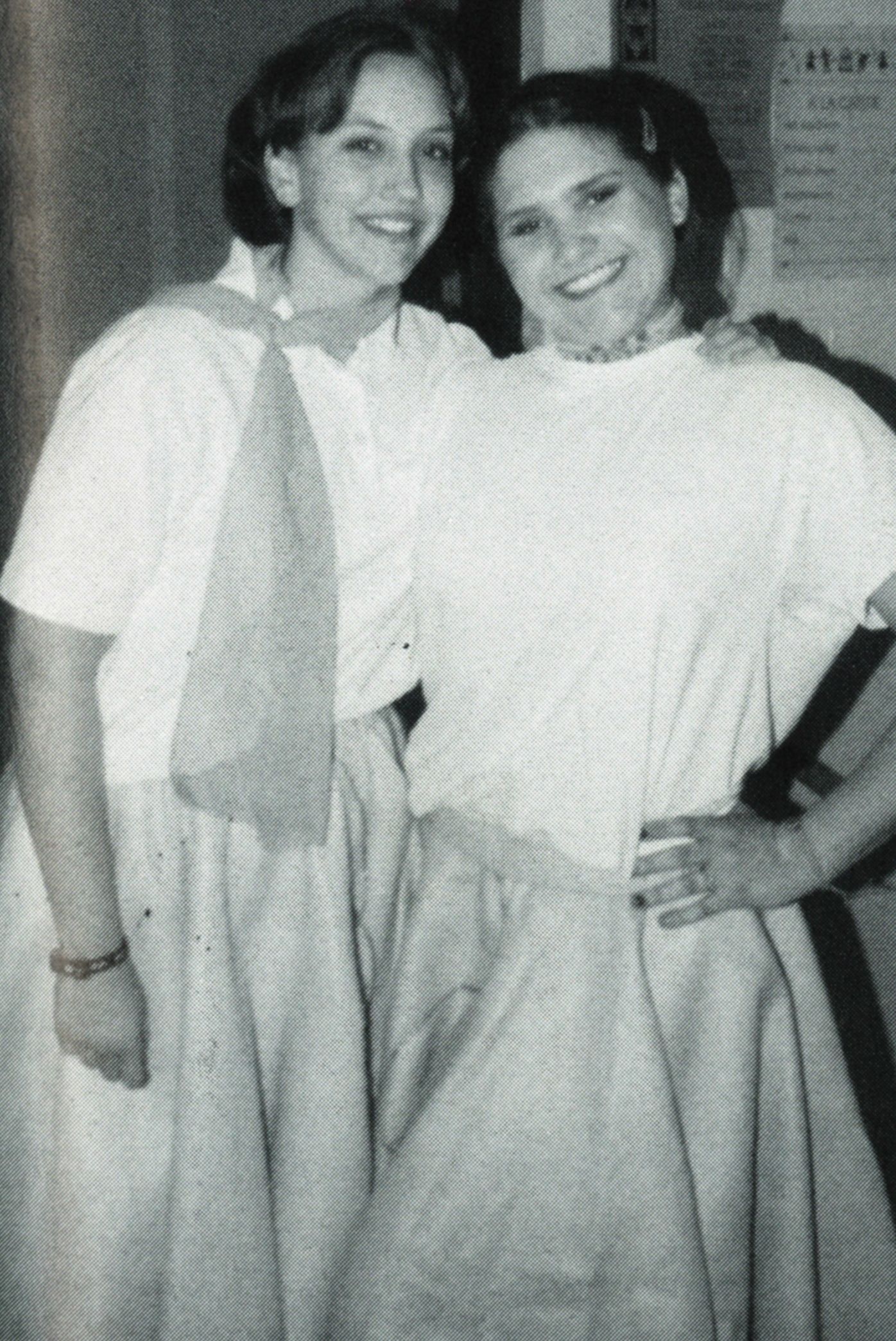 Two girls dressed for a sock hop themed event