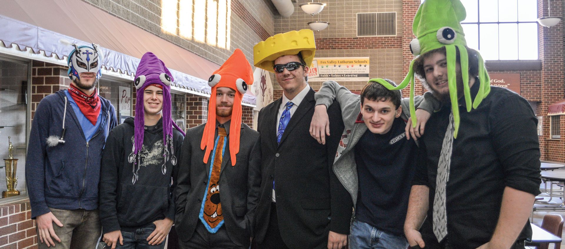 Group of guys wearing silly hats for a dress-up day