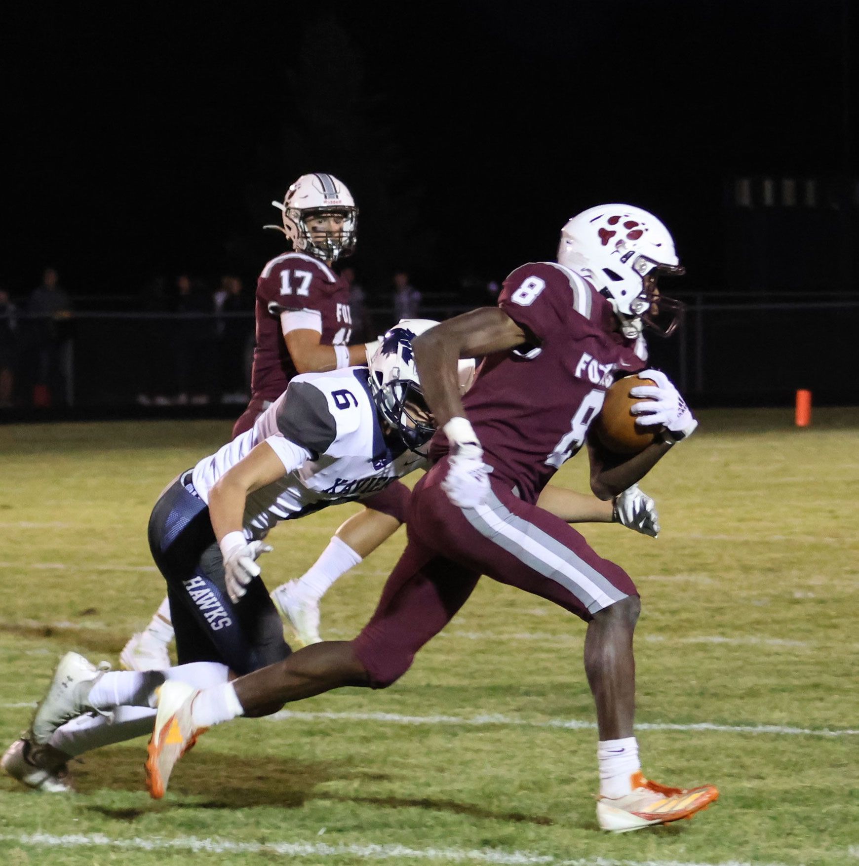 Football player running with the ball