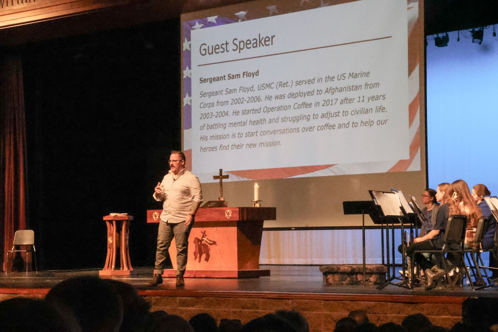 Guest speaker, Sam Floyd, on stage giving his presentation