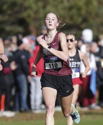 Claire Fischer, in a cross country race