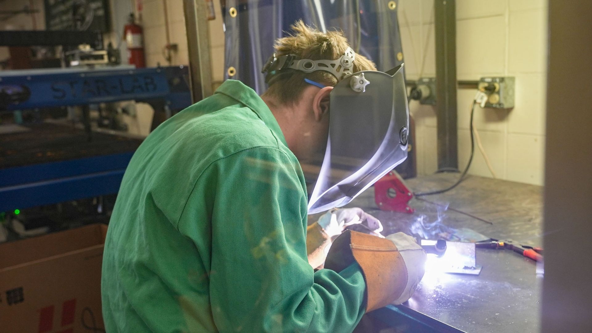 Student doing welding