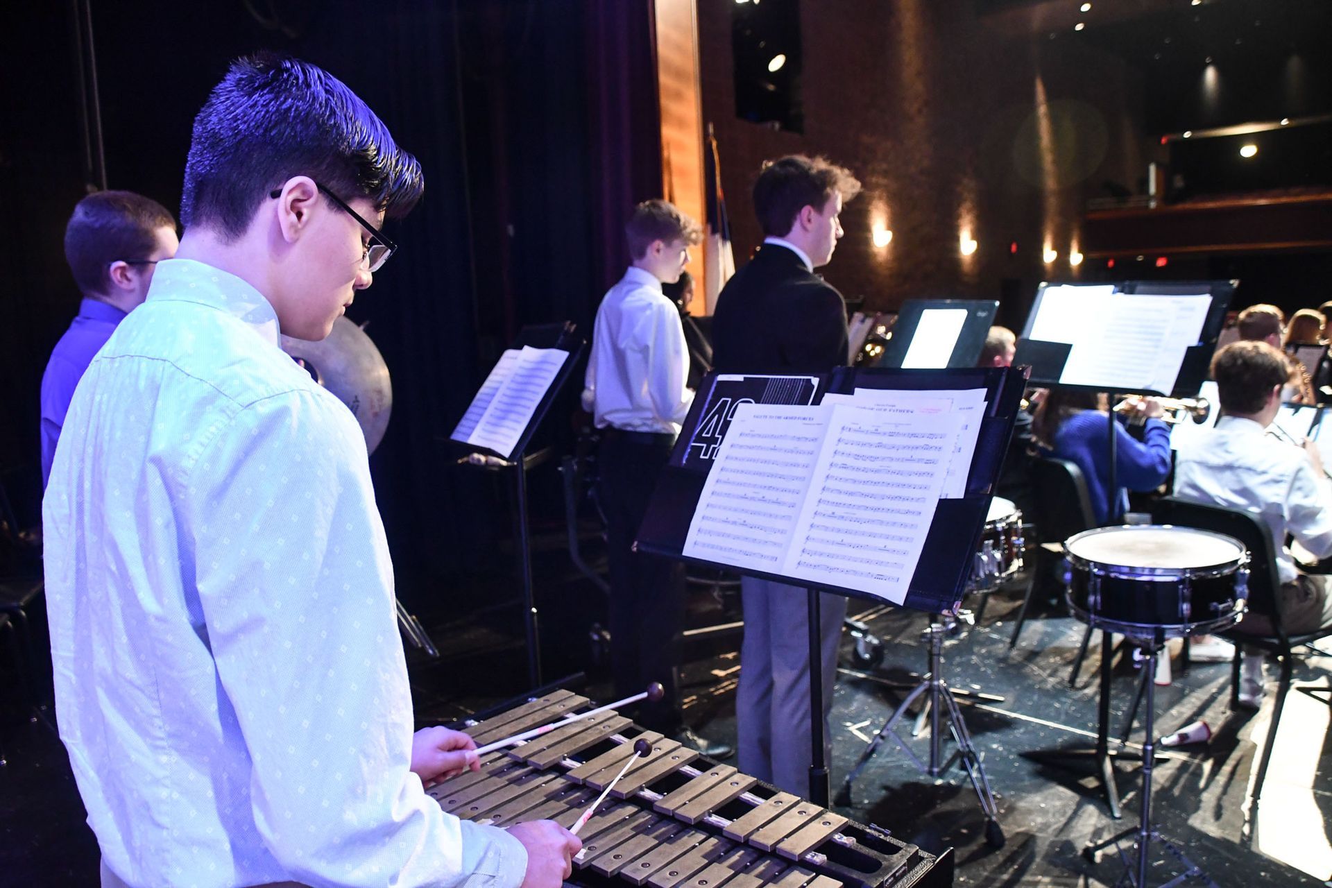 Students playing the trumpet during the service