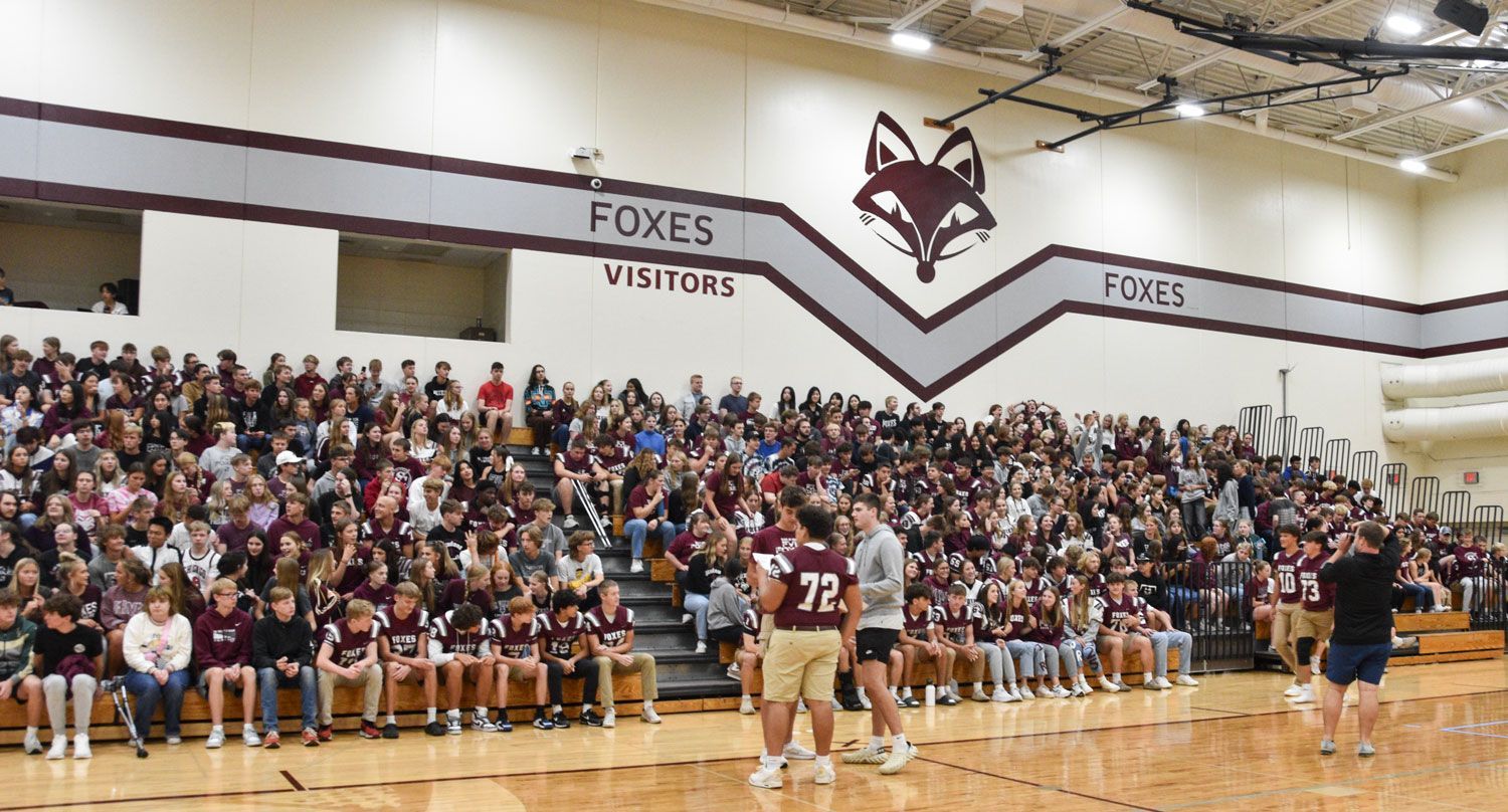 FVL gym on pep rally day, filled with students in maroon and grey