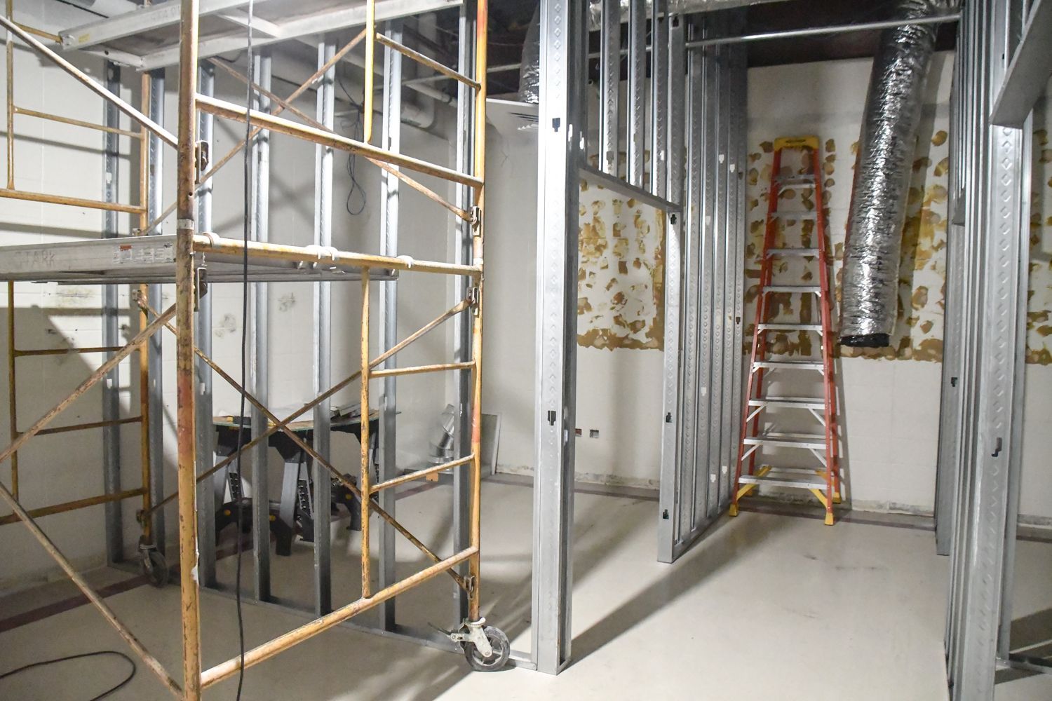 Supports for walls going up in the Communications Suite