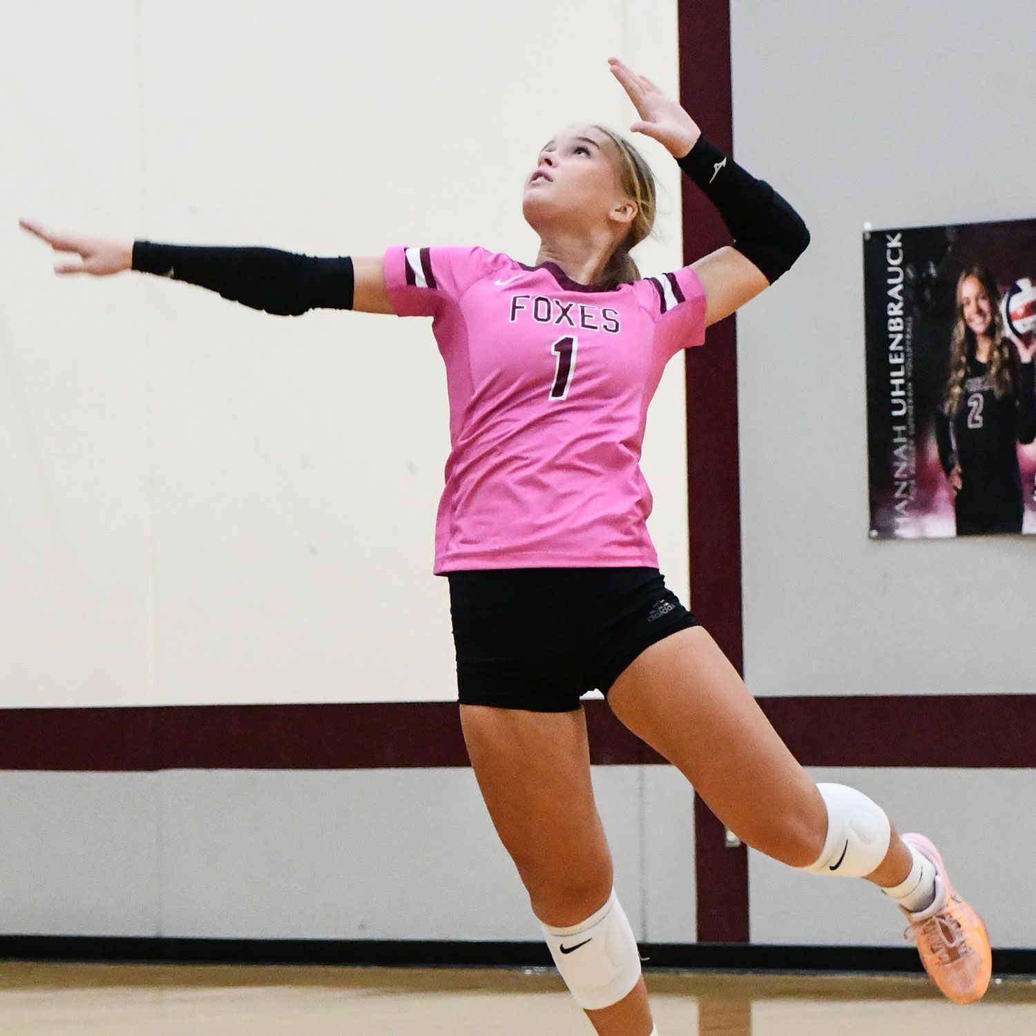 Volleyball team with their Conference Champs plaque