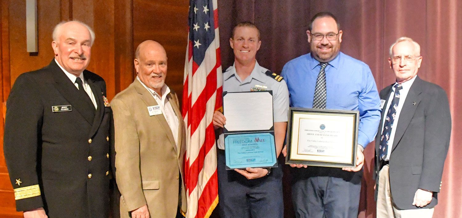 Ben Stern and Alan Nolte with certificates awarded to the school for the WI ESGR Above and Beyond Award