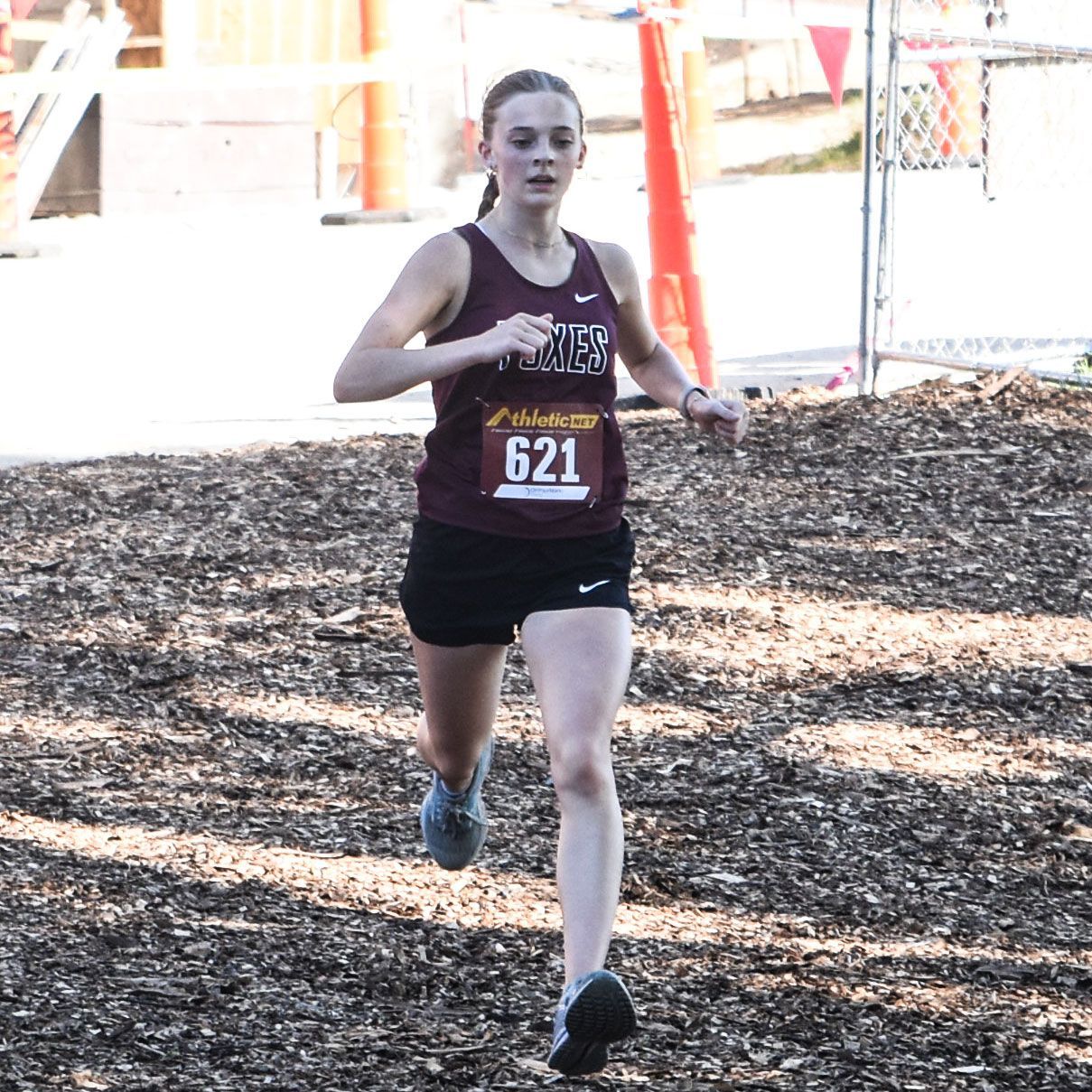 Kristen Donart, running a cross country race