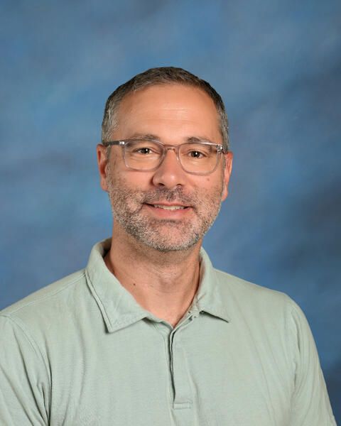 Smiling head shot of Jonathan Favorite