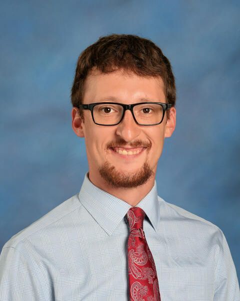Smiling head shot of Jesse Noffitz