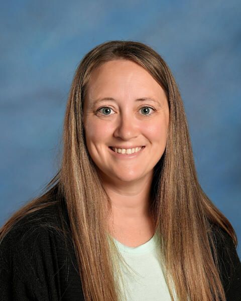 Smiling head shot of Mary Robinson