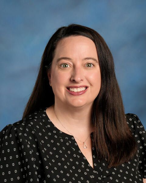 Smiling head shot of Julie Sieg