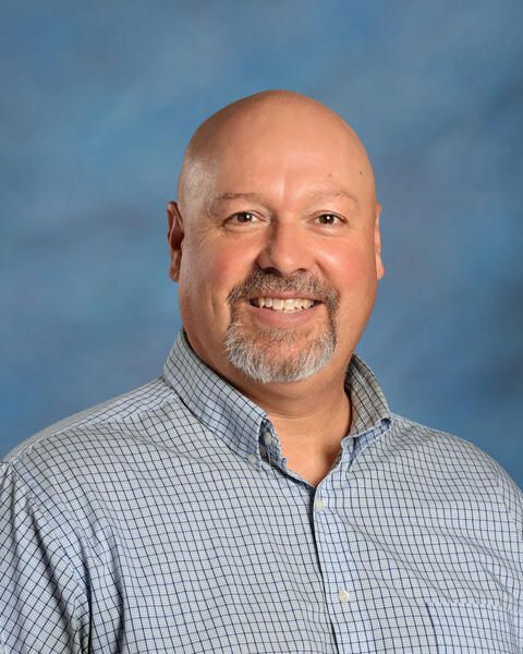 Smiling head shot of Darin Stewart