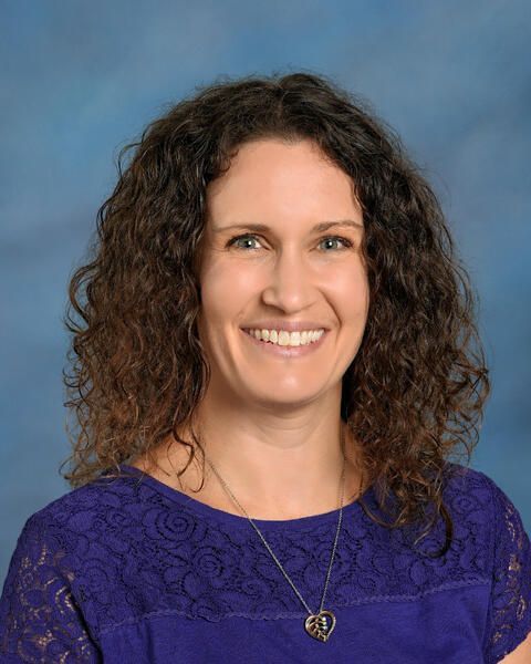 Smiling head shot of Jennifer Vik