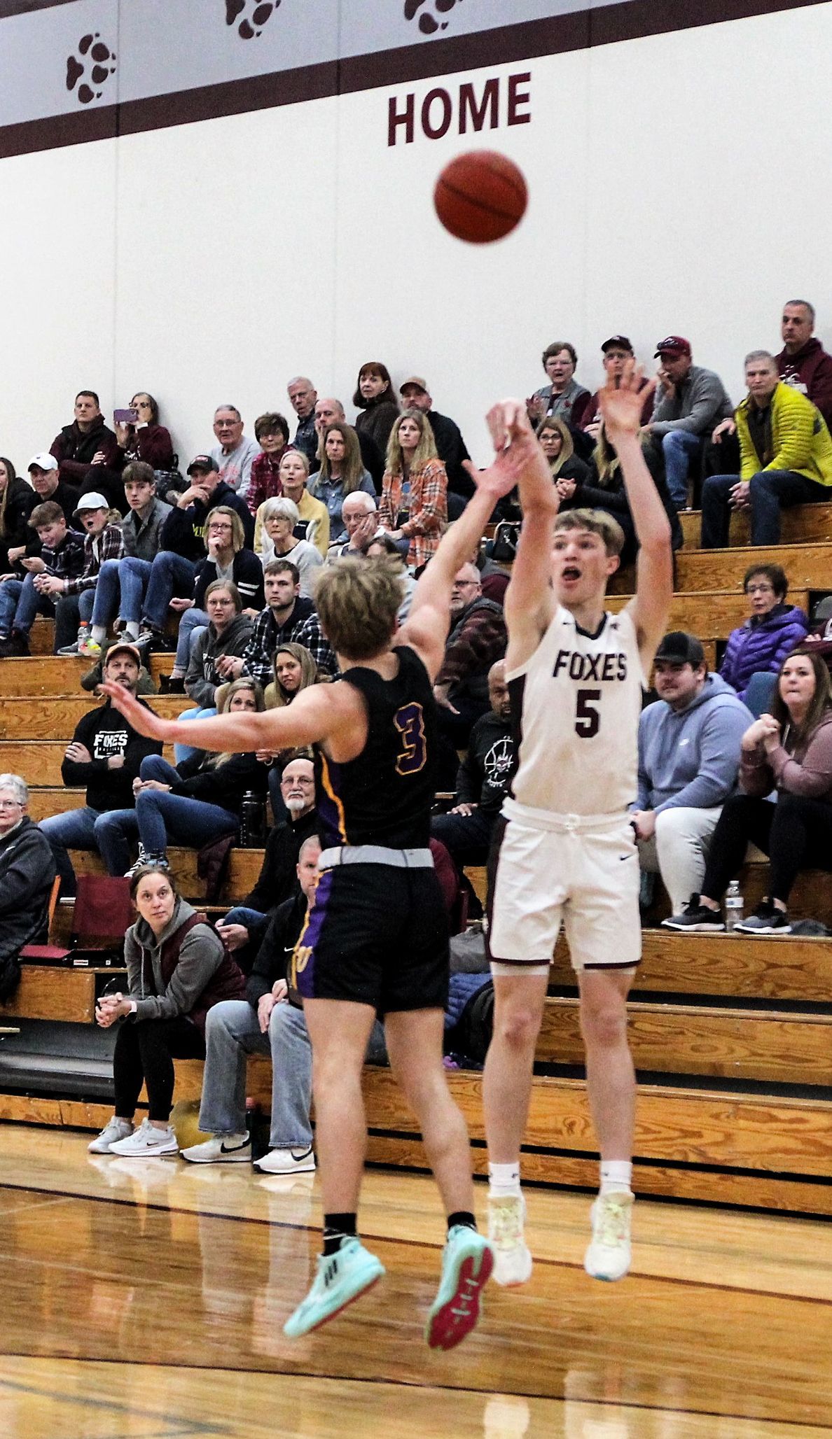 Adam, shooting a basket during a game